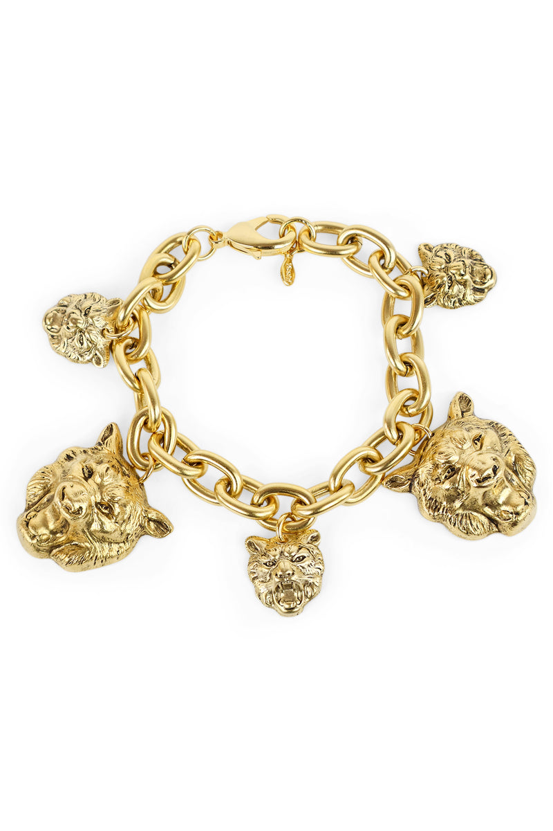 Hand crafted in New York, the Yochi Lionhead Charm Bracelet features ferocious 22k gold plated brass lionhead charms and chain.
