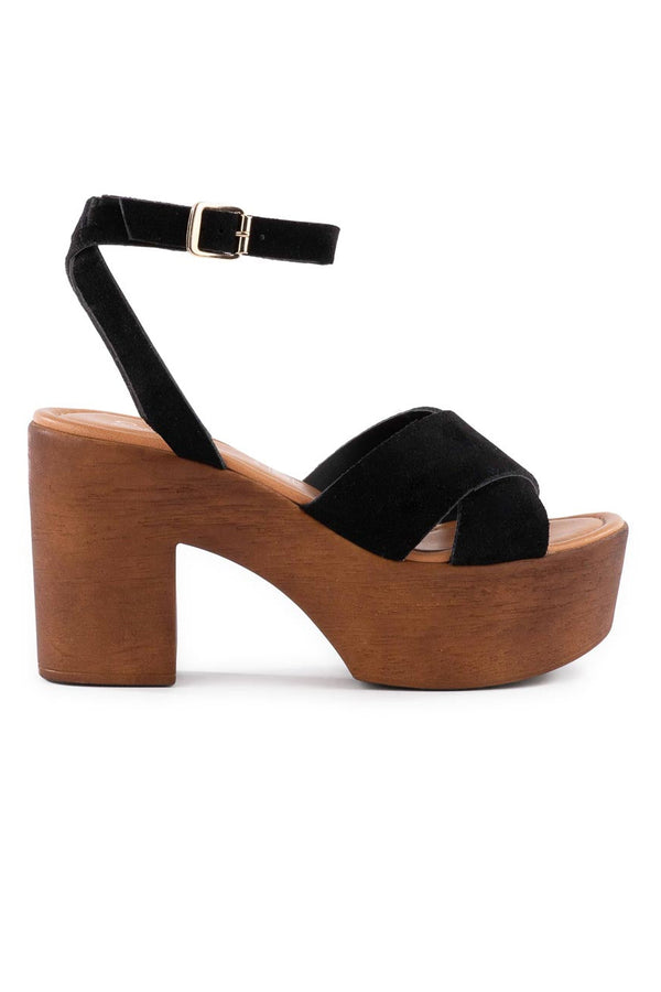 Seychelles' statement-making Sweetener Suede Platform Sandals are lifted by a towering block heel and platform featuring a classic rounded toe with crossover upper, and a slim wraparound ankle strap.  Heel Height: 3.5” Platform: 1.25” Material: Leather Fit: True to size Toe Shape: Round Buckle closure