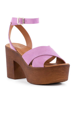 Seychelles' statement-making Sweetener Suede Platform Sandals are lifted by a towering block heel and platform featuring a classic rounded toe with crossover upper, and a slim wraparound ankle strap.  Heel Height: 3.5” Platform: 1.25” Material: Leather Fit: True to size Toe Shape: Round Buckle closure